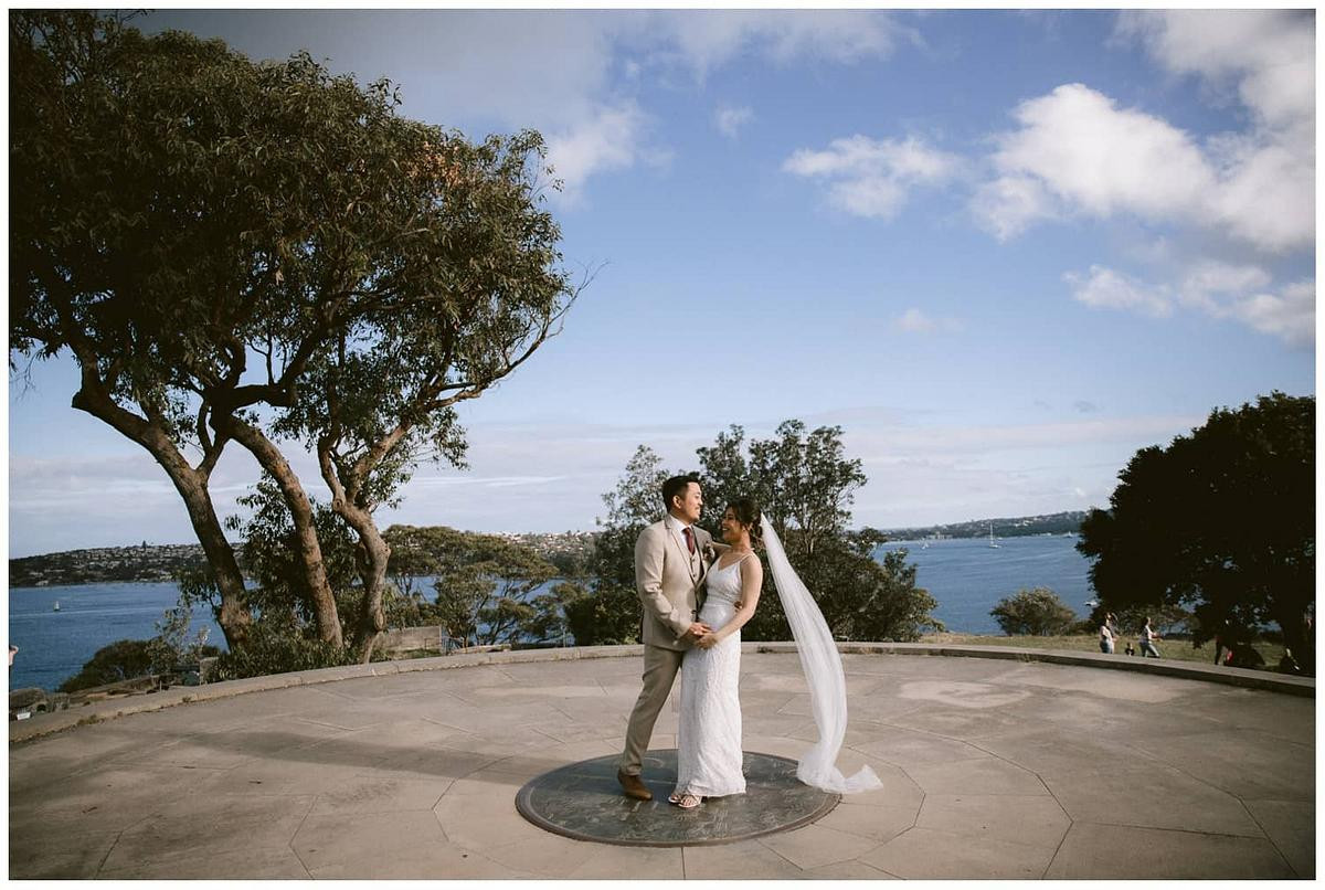 Bride and groom practising their first dance at Georges Head Lookout Gunners Barracks Mosman..